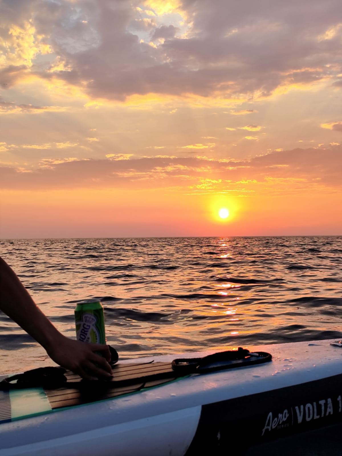 Golden sunset over the open Adriatic from the boat