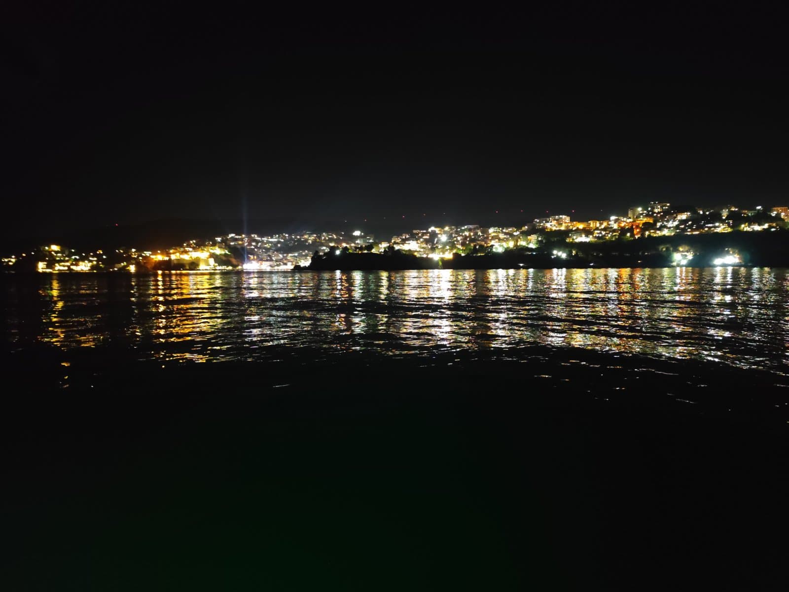City lights across the bay at night